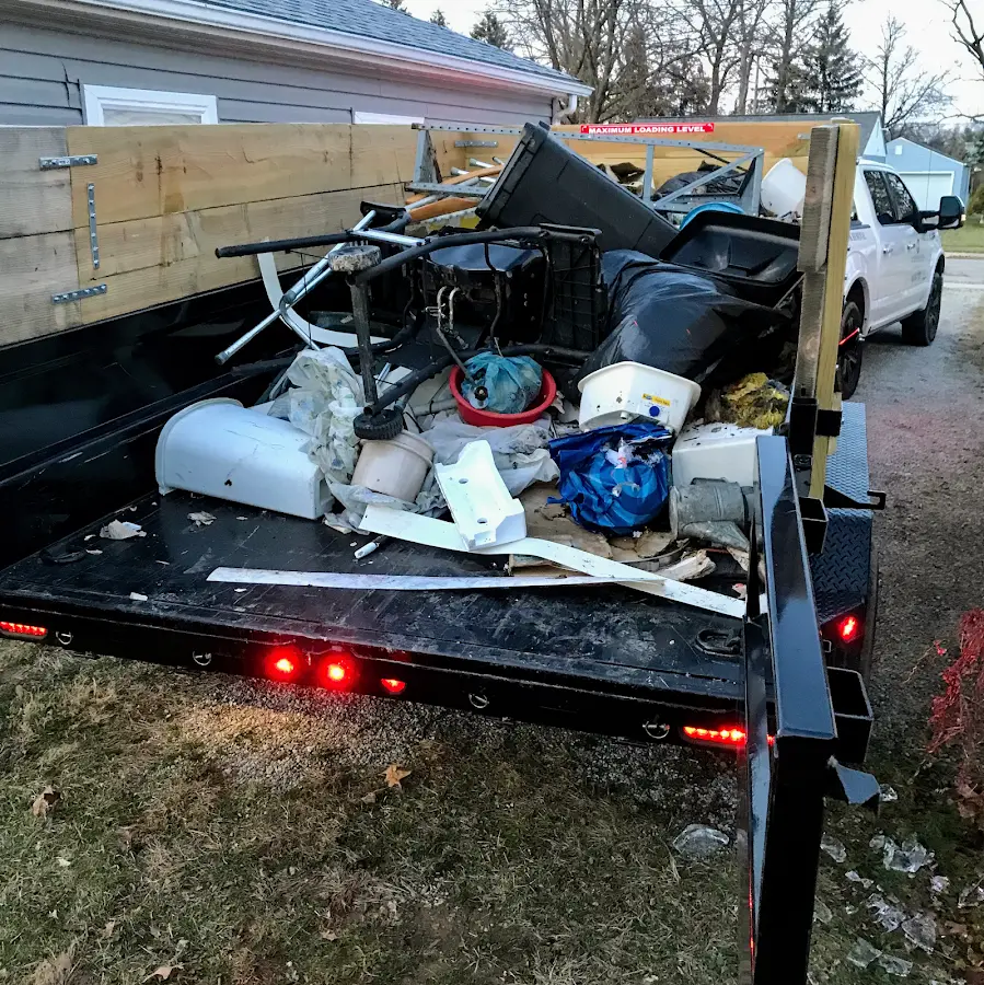 Roll-off dumpster delivered to a residential driveway in Hazard